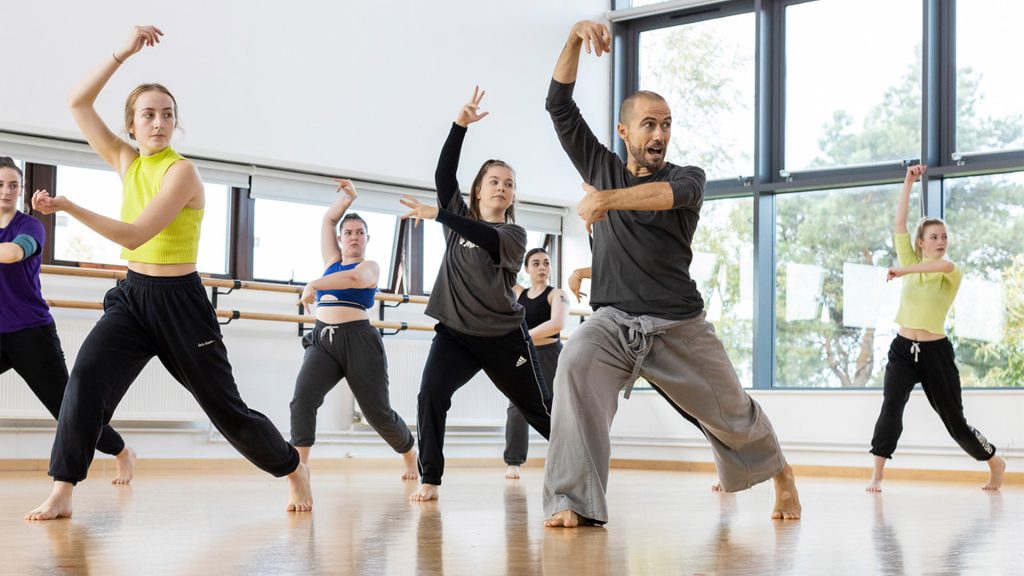 Dancers rehearse a routine