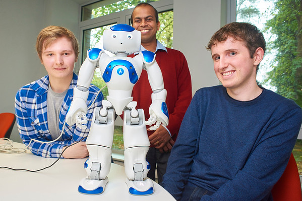 Students pose with Robbie the Robot