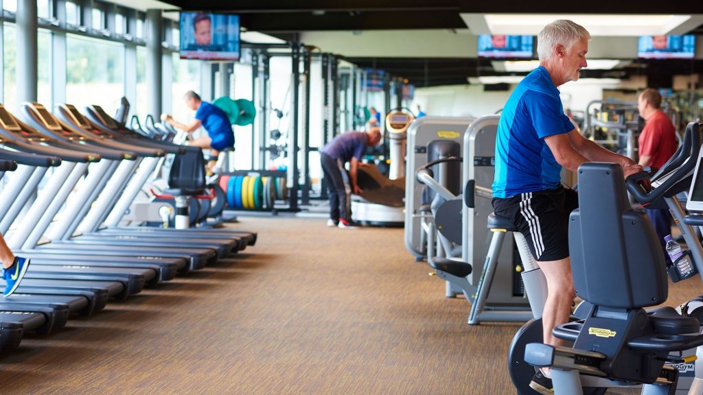 An image of people using the gym equipment in the on-campus gym at Edge Hill.