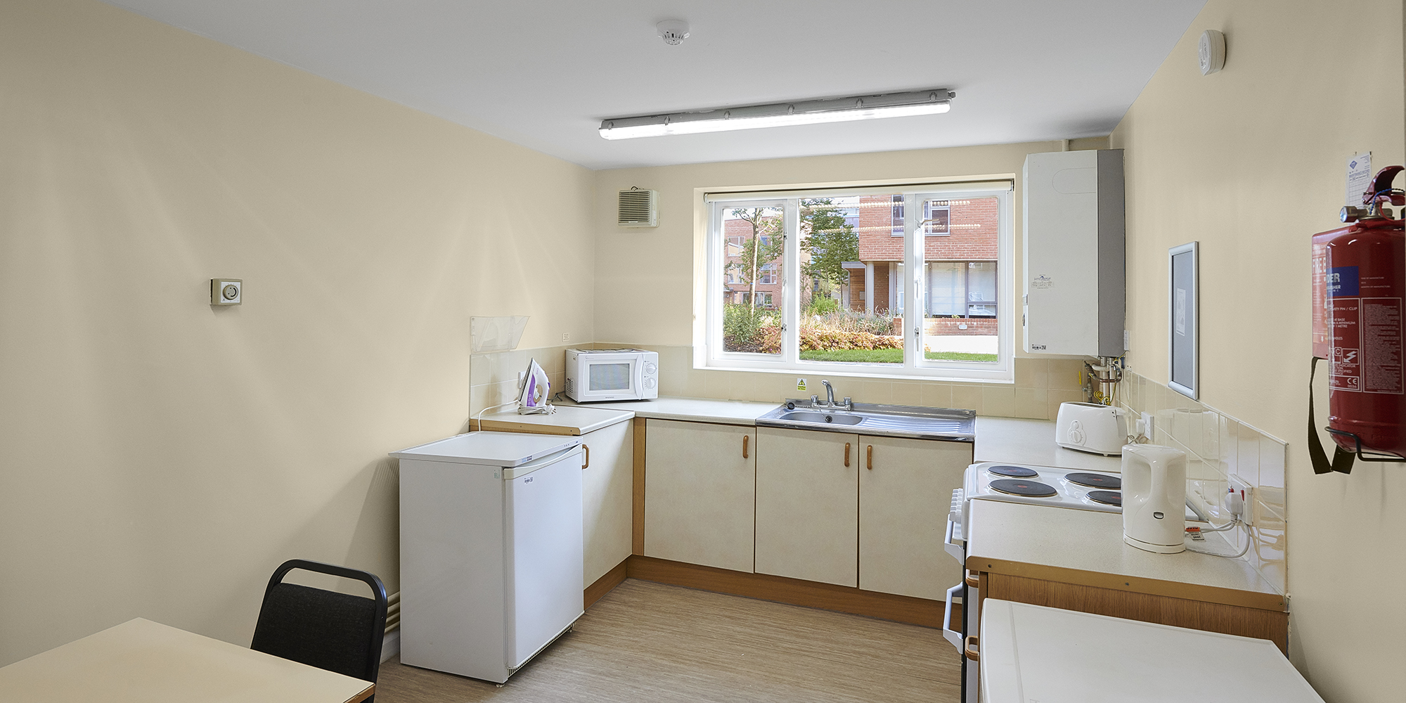 A kitchen and small table in Forest Court.