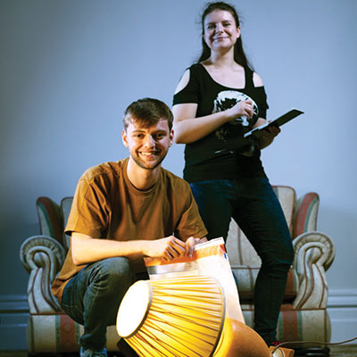 Two students in a simulated crime scene room