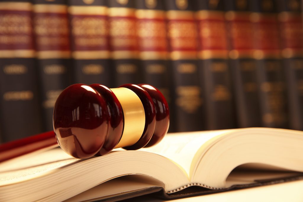 a gavel resting on an open book