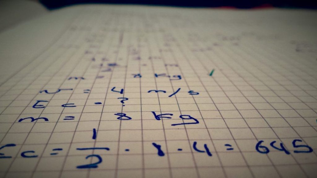 An image of maths calculations on a piece of paper.