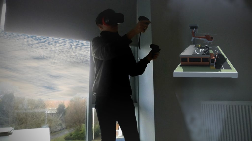 Psychology Student Juris Savostijanovs using virtual reality headset