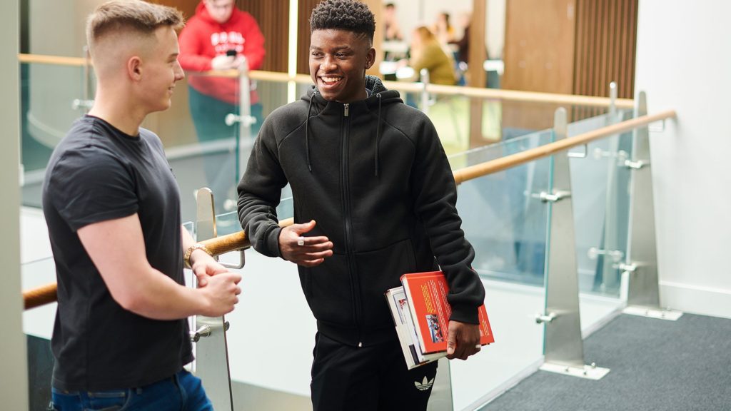 Two students are talking.
