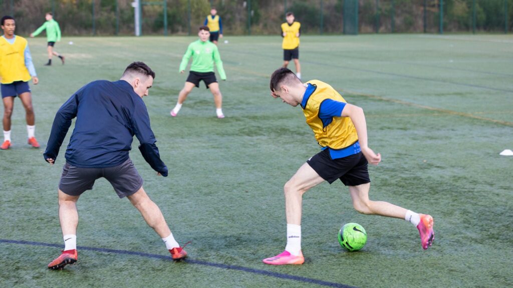 A group of students playing football