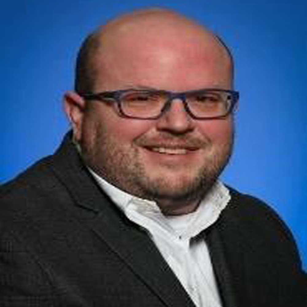Headshot of Jason James