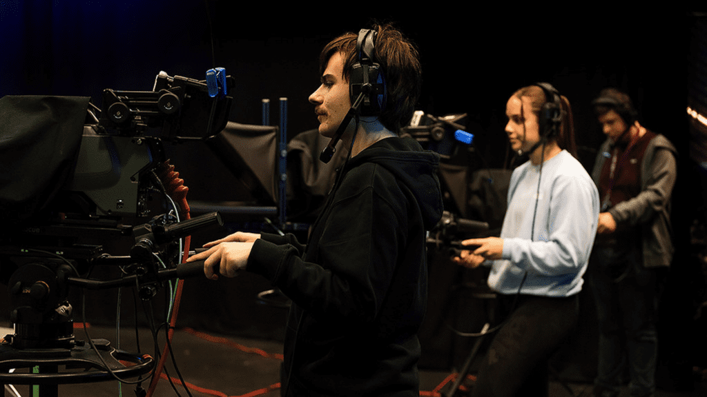 Students filming in the Creative Edge TV Studio