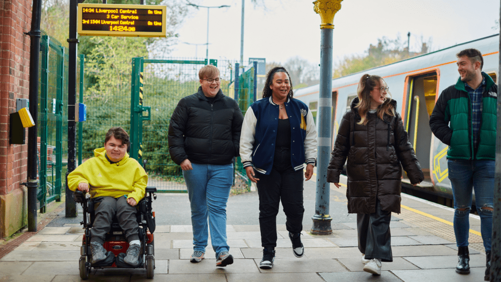 Students walking along the platform at Ormskirk train station.