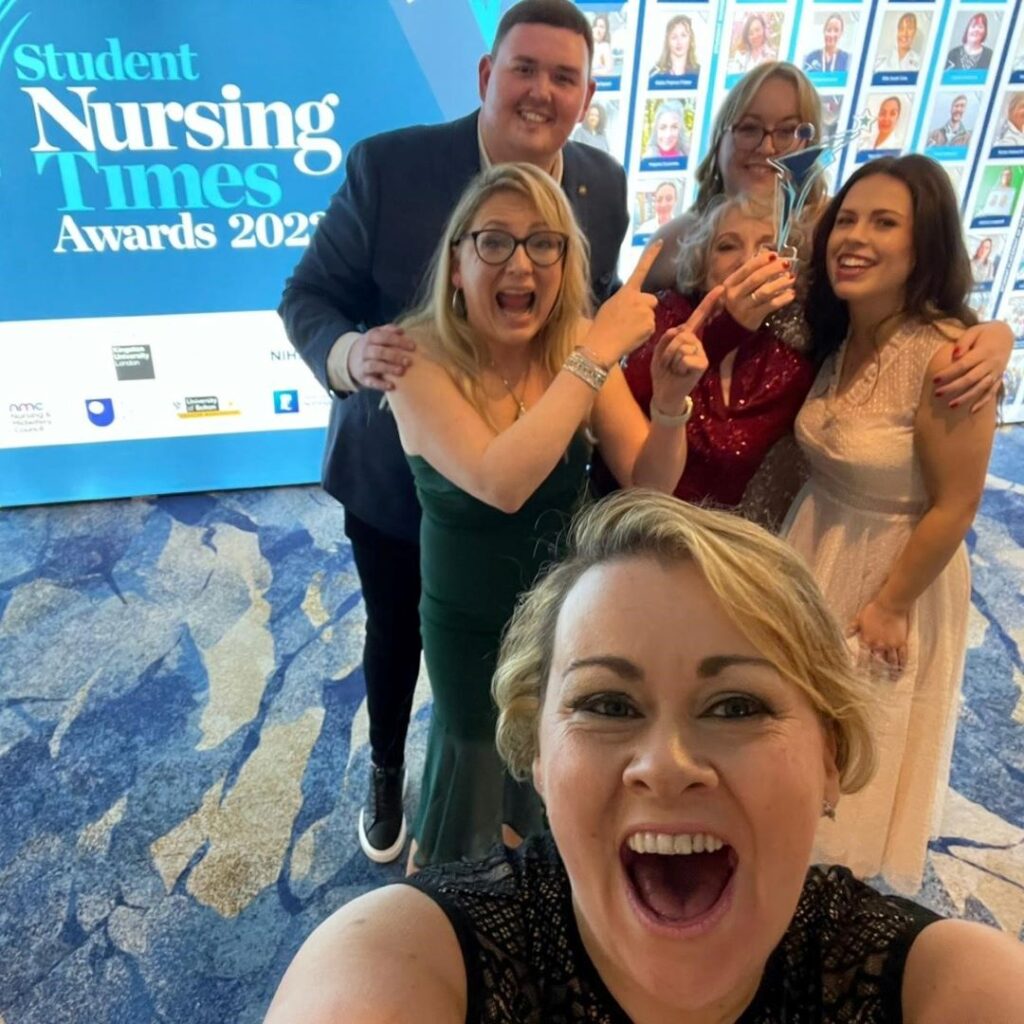 Nursing staff holding their award.