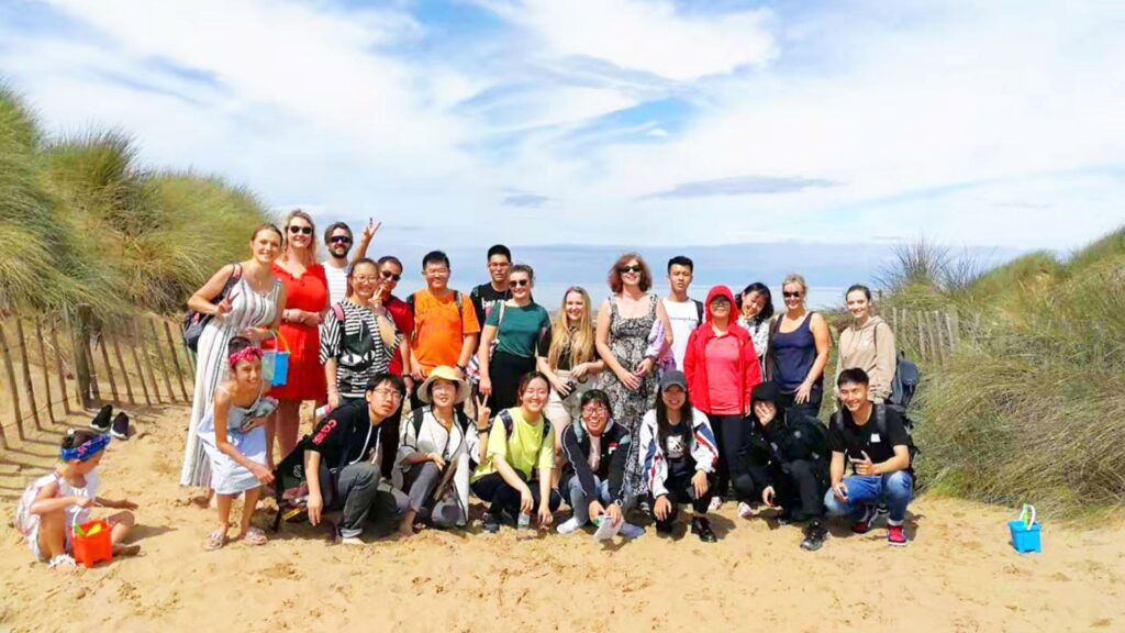 International summer school students enjoy the beach