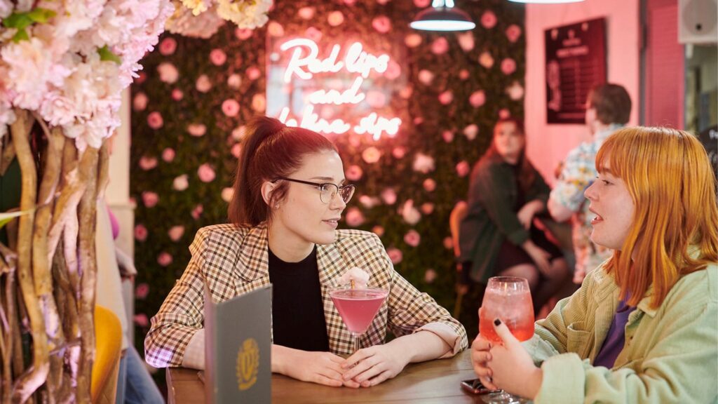 Students enjoy cocktails in a bar in ormskirk