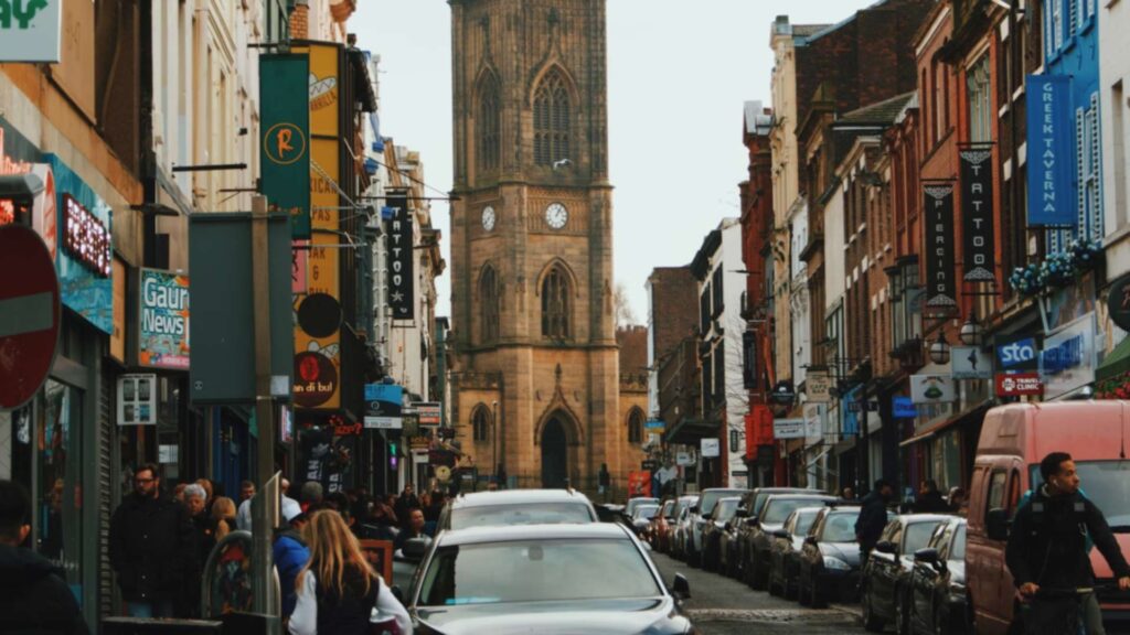 a busy street, filled with shops and people in Liverpool