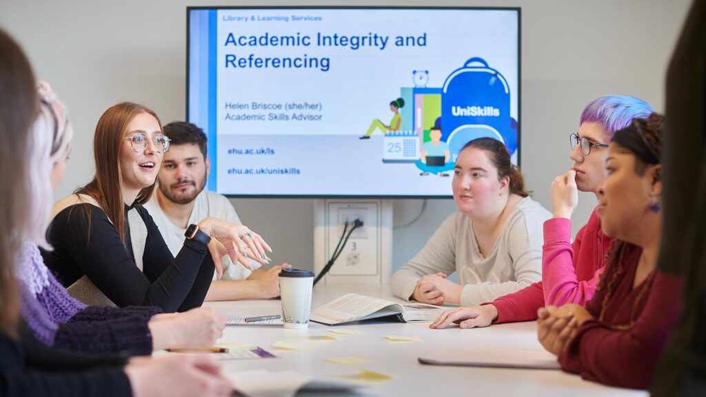 Students in a discussion session surrounding academic integrity and referencing