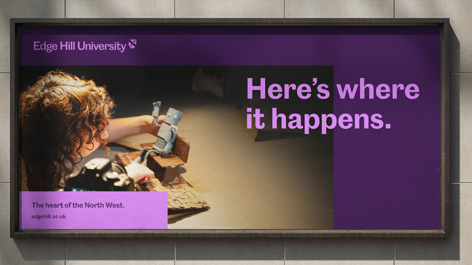 Large, outdoor advert with the message, "Here's where it happens".