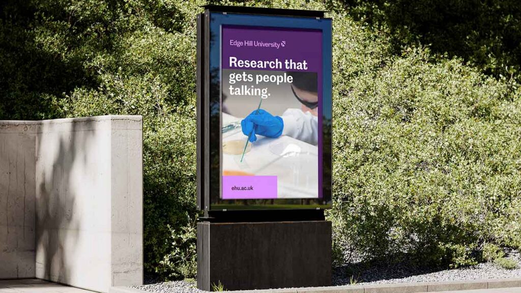 An outdoor sign with the message, "Research that gets people talking".