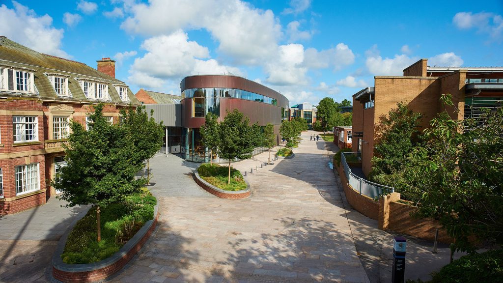 The centre of campus, showing the traditional main building, the modern Hub and the Wilson Centre.