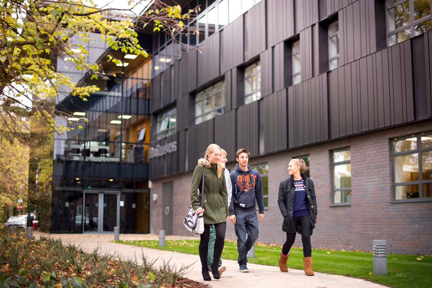 Students walk outside the BioSciences building.