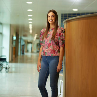 BA (Hons) Health & Social Wellbeing student Chloe Webb in the Faculty of Health, Social Care and Medicine building