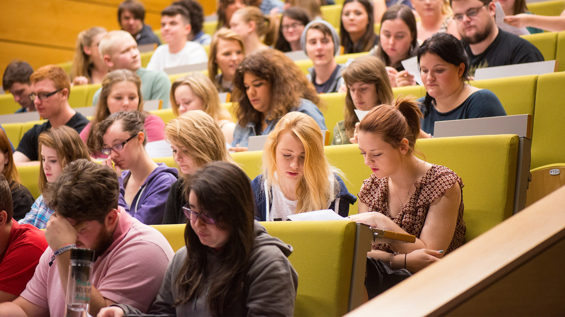 Students in a busy lecture theatre