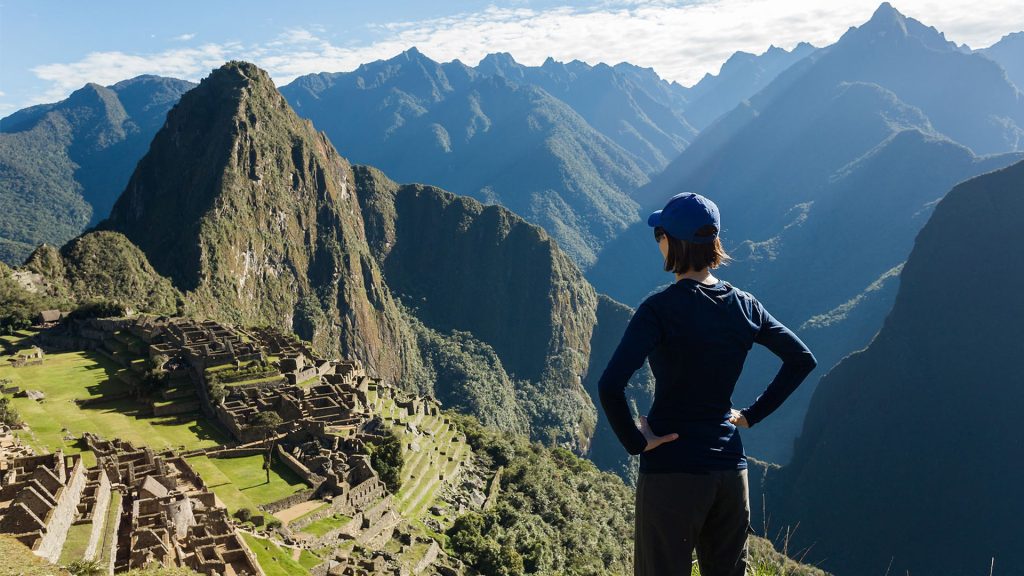 Someone standing looking at Machu Pichu mountain