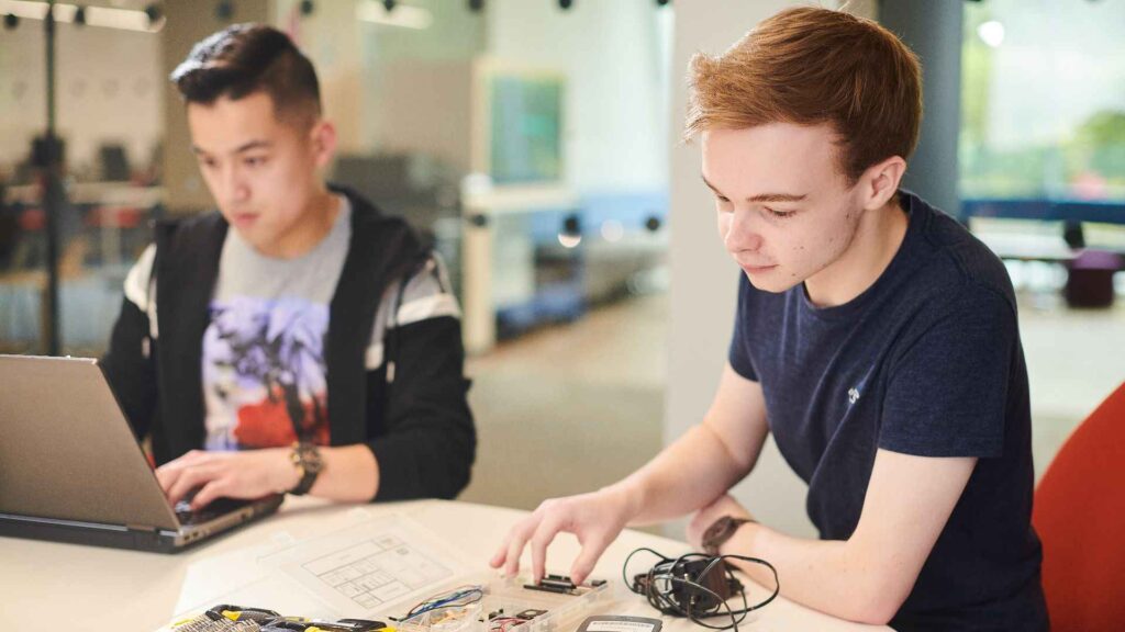 Two students working on a project