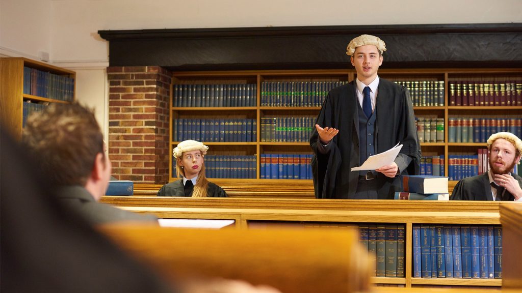 Law students in the mooting society mock courtroom