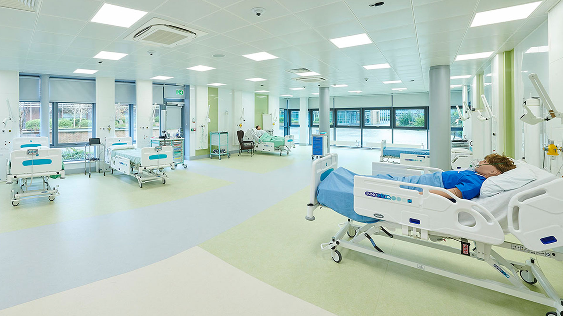 Large simulation ward with mannequins in hospital beds in the Clinical Skills and Simulation Centre building