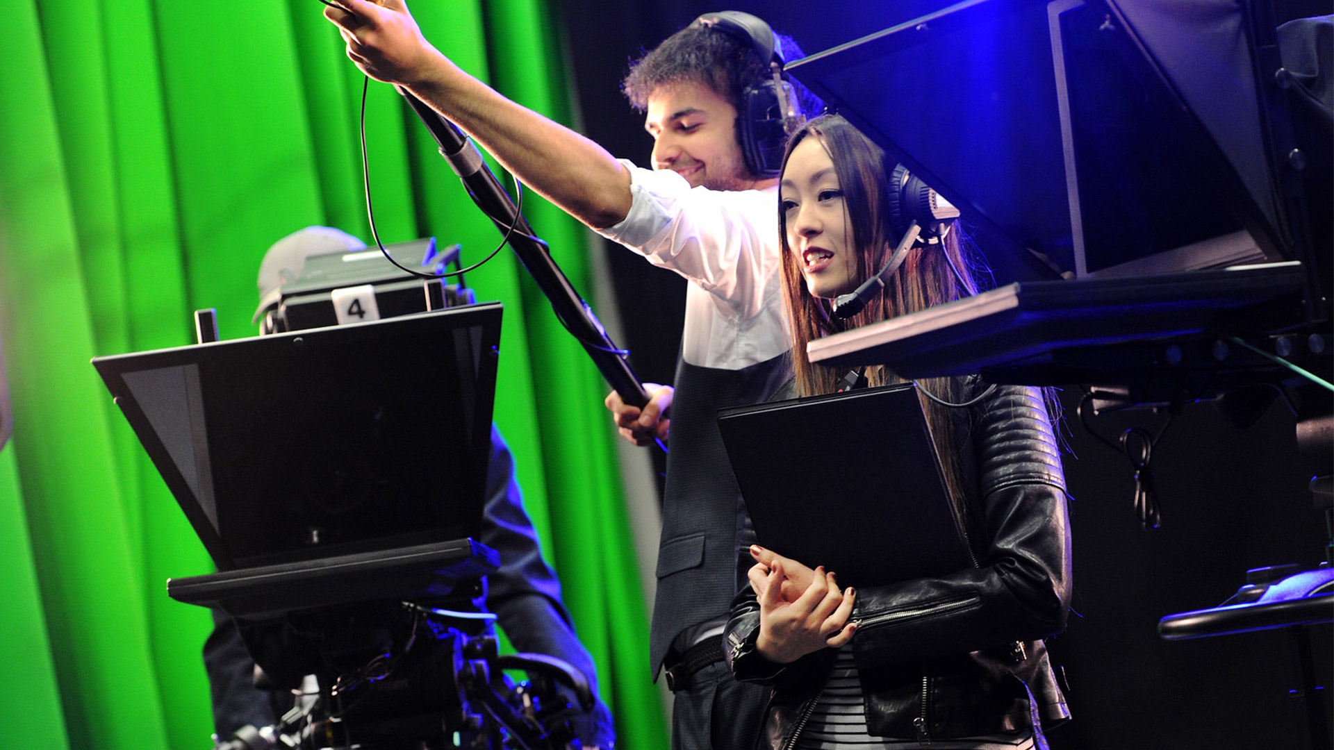 students recording in the tv studio