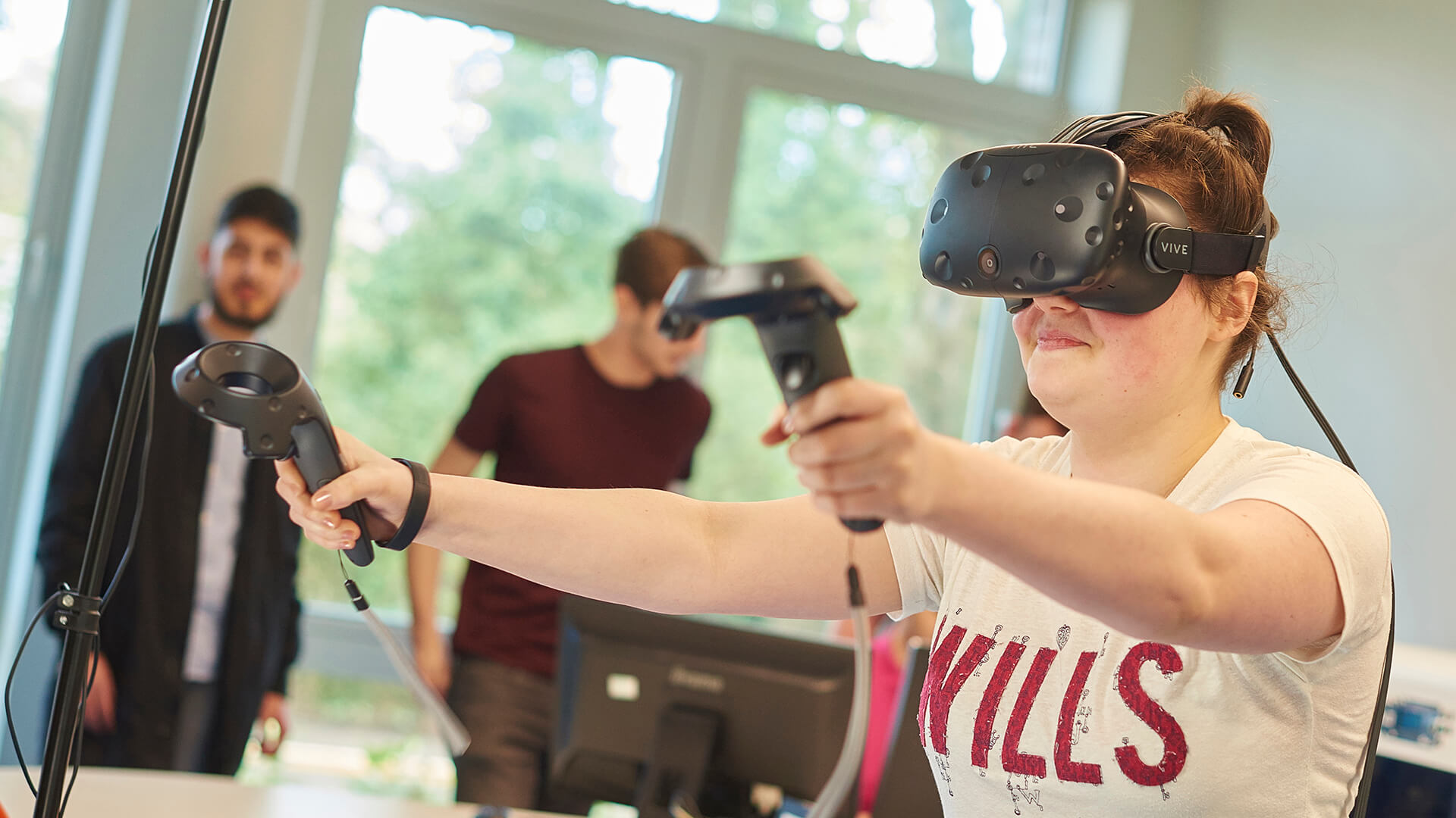A student uses virtual reality equipment in the Tech Hub.