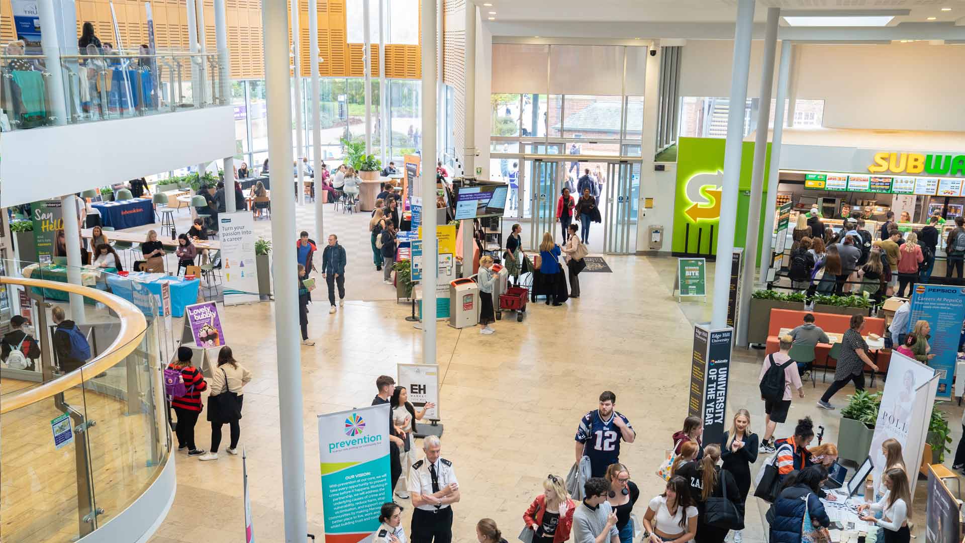 The busy hub area including eateries and information stands.