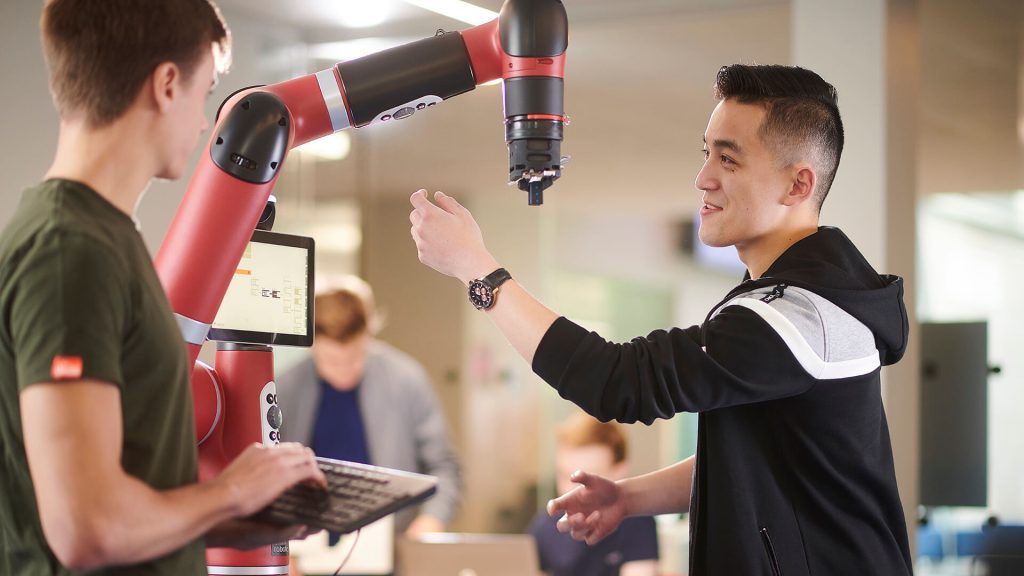 Students apply their knowledge of programming to the Sawyer robot.