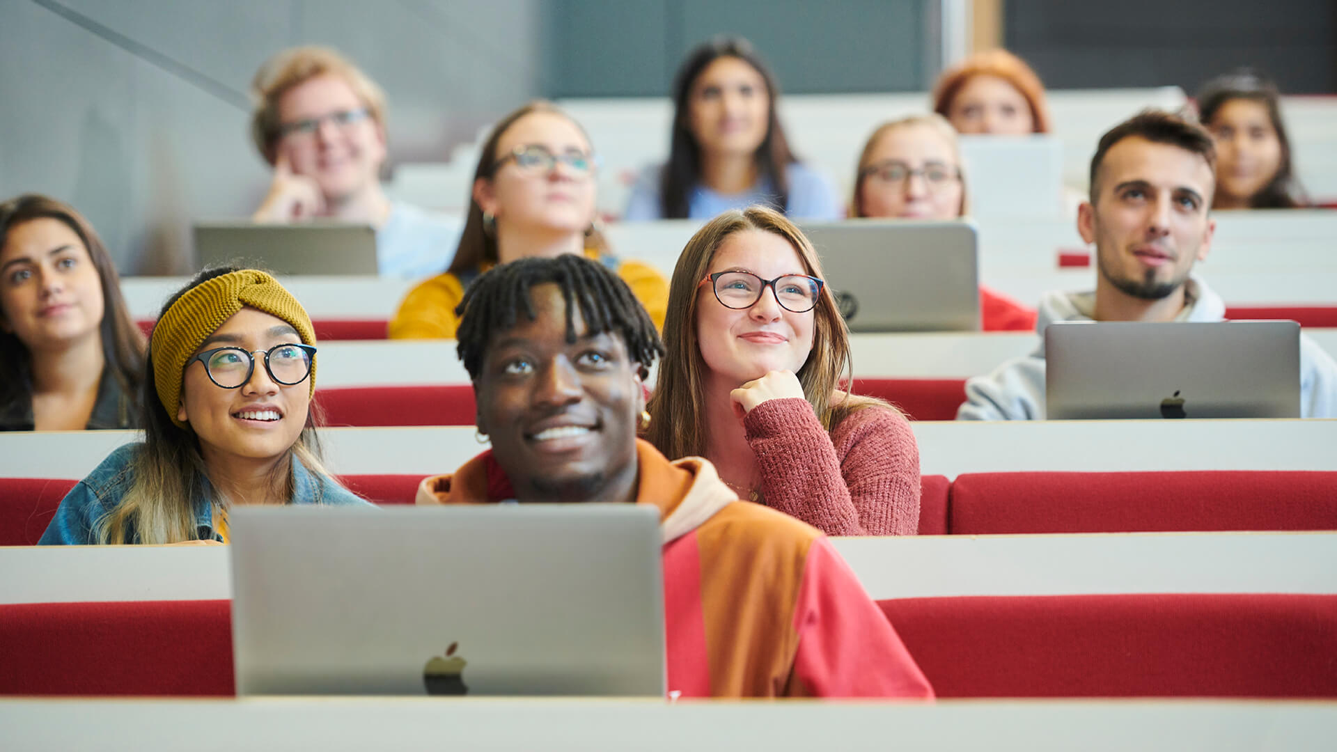 Students listen attentively during a lecture.