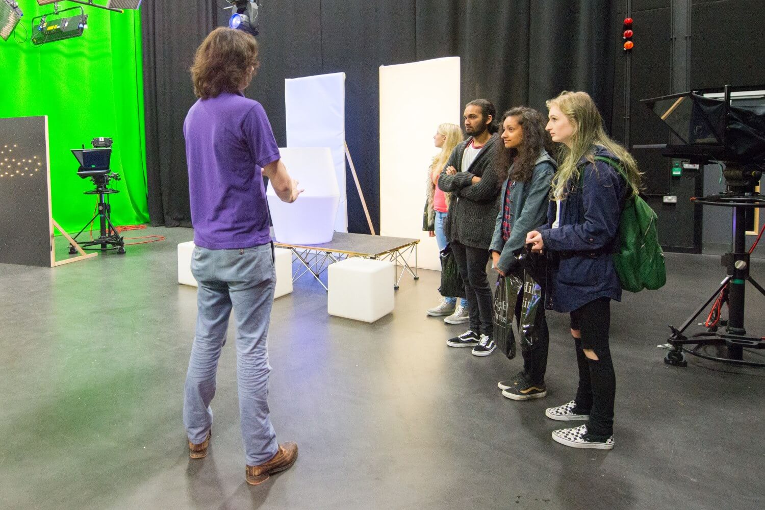 Prospective students receive a tour of the TV studio in Creative Edge during an applicant visit day.