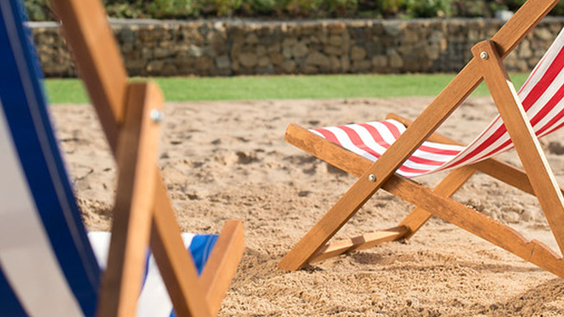 Two beach chairs on the on-campus beach