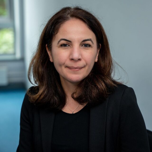 A headshot of Ella-Pereira