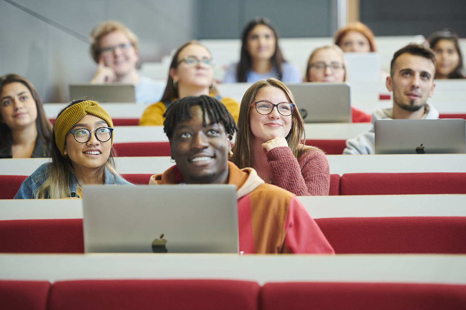 Students listen attentively during a lecture.