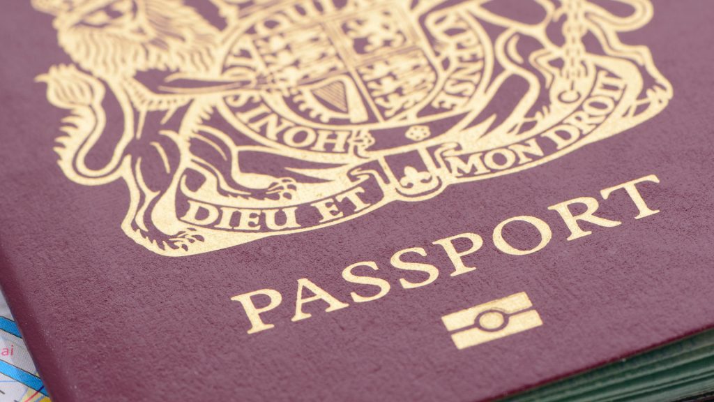 A close up of a UK passport cover