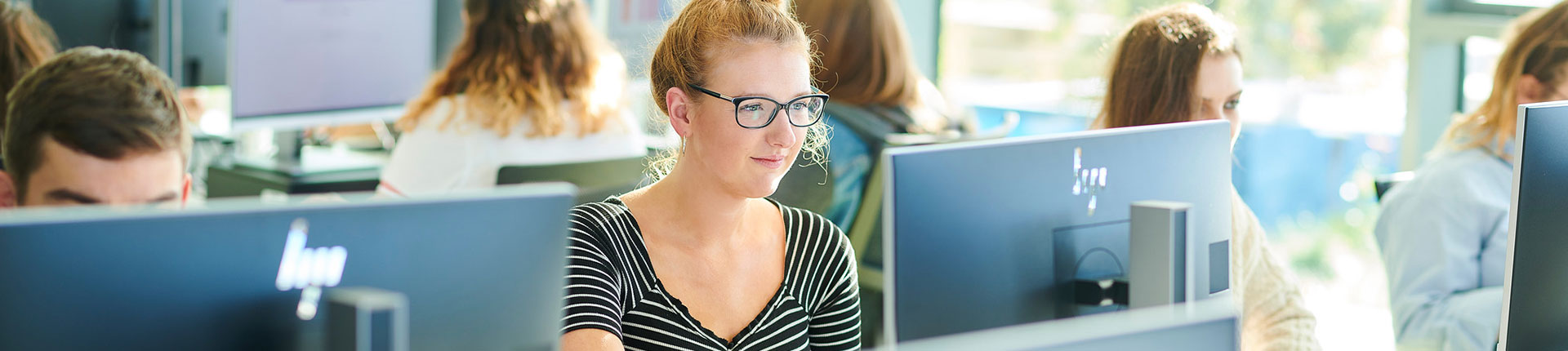 Student at a computer in the Catalyst
