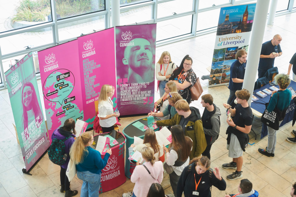 A group of people at a UCAS fair taken from above