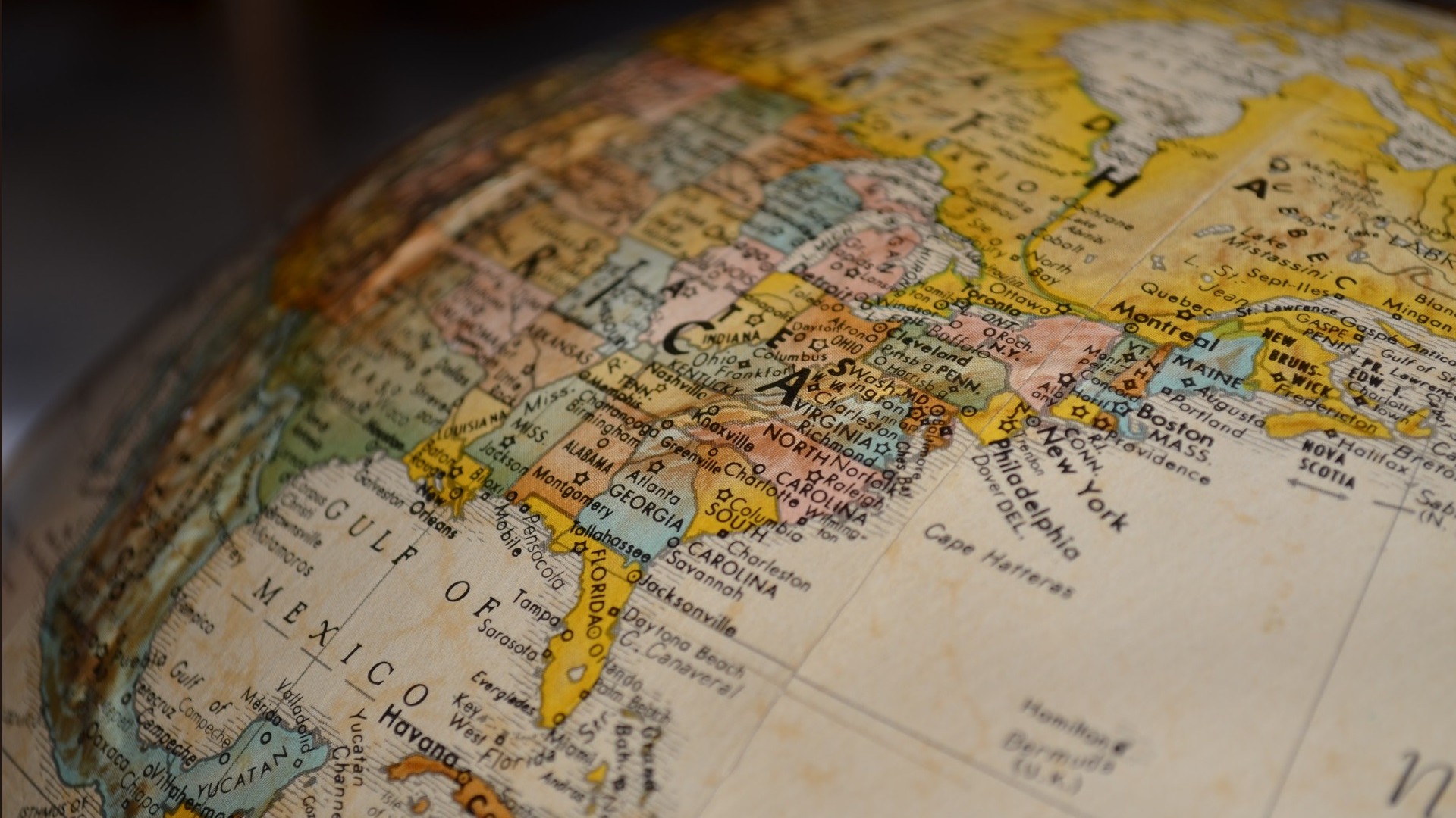 A globe of the world that is focusing on eastern america, highlighting states such as Georgia, Virginia and Carolina.
