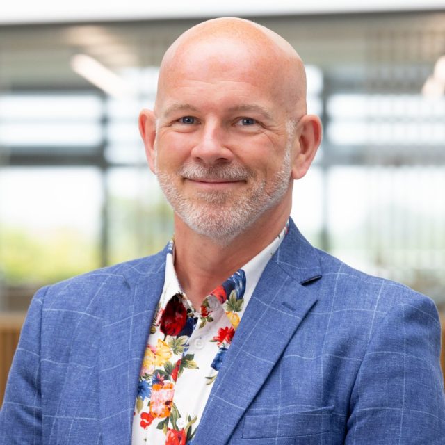 Headshot image of Chris Greenough