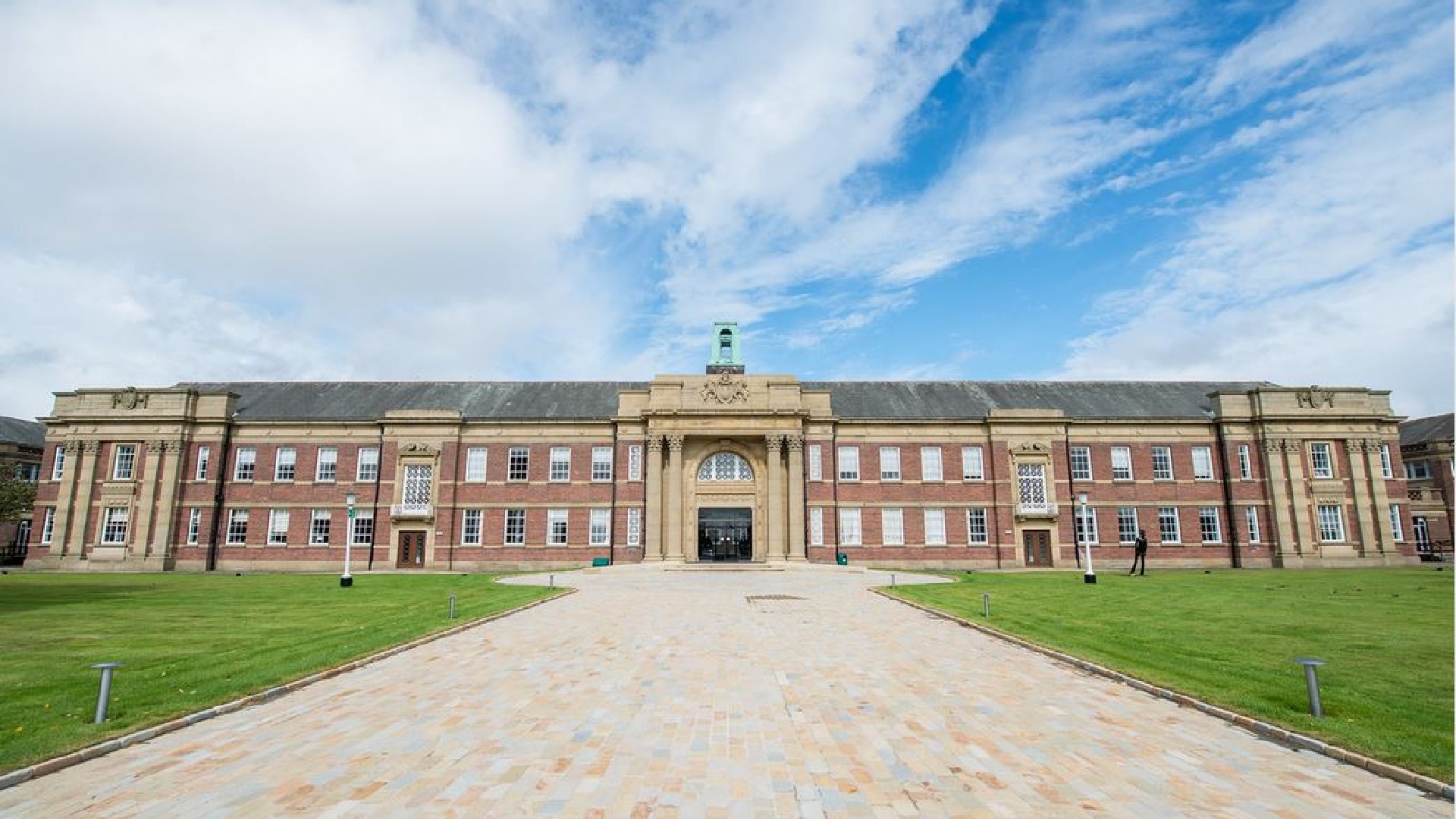 An image of the front of the Main Building at Edge Hill University. The image is set in the day.