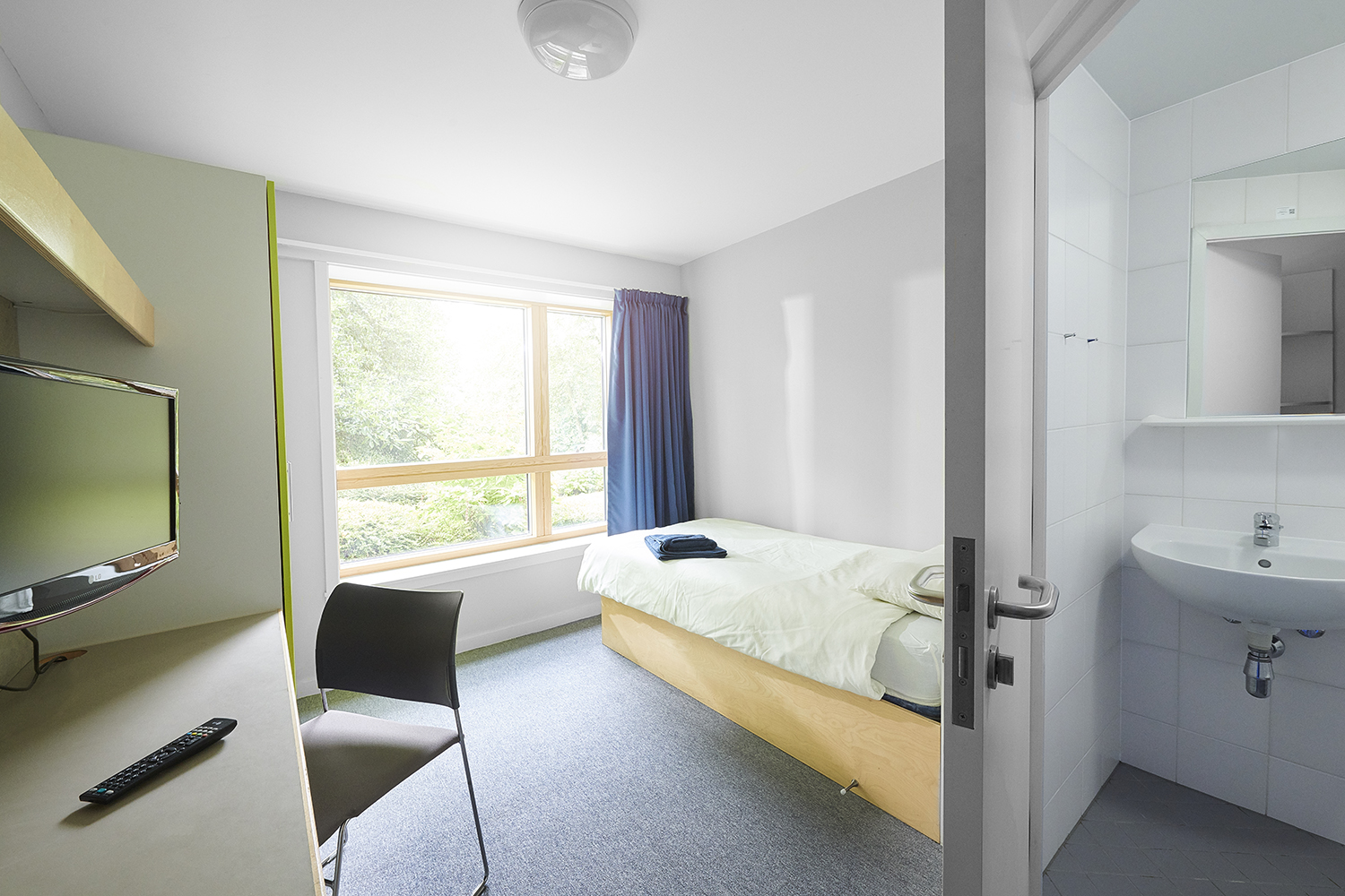 A student bedroom and en-suite shower room in a Founders hall of residence.