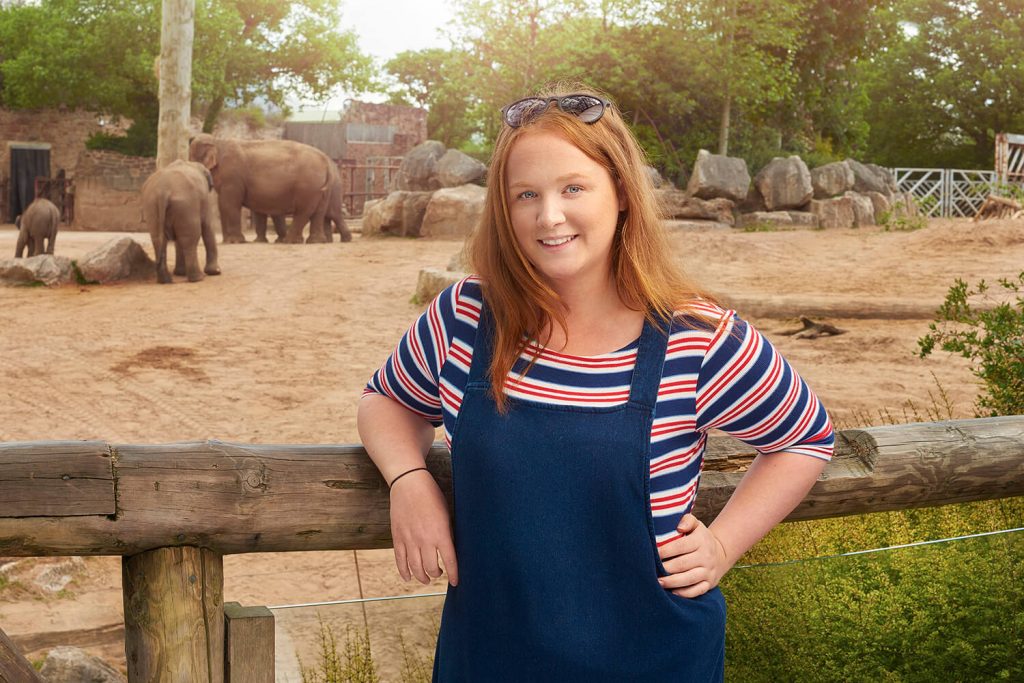 Megan Hughes by the elephant enclosure at Chester Zoo where she completed a placement as a Production Coordinator for Channel 4's The Zoo.