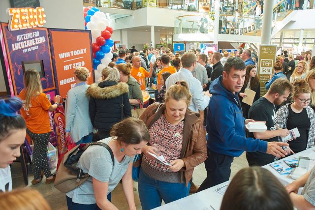 Students visit the stalls at a busy Welcome Fair in the Hub.