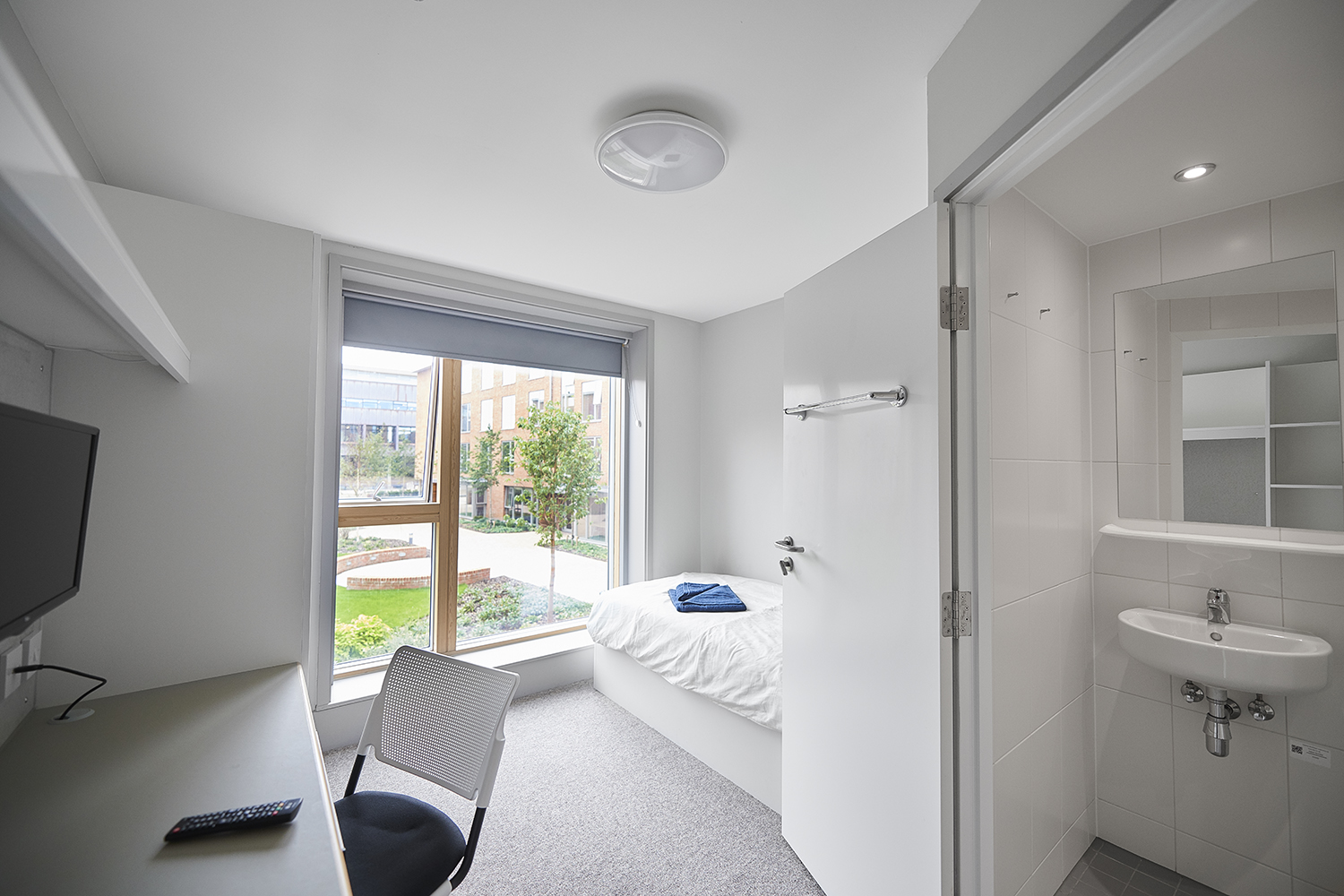 Bedroom and en-suite shower room in Woodland Court.