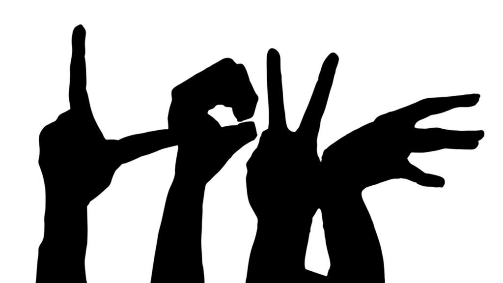 hand spelling out letter form the alphabet in British sign language