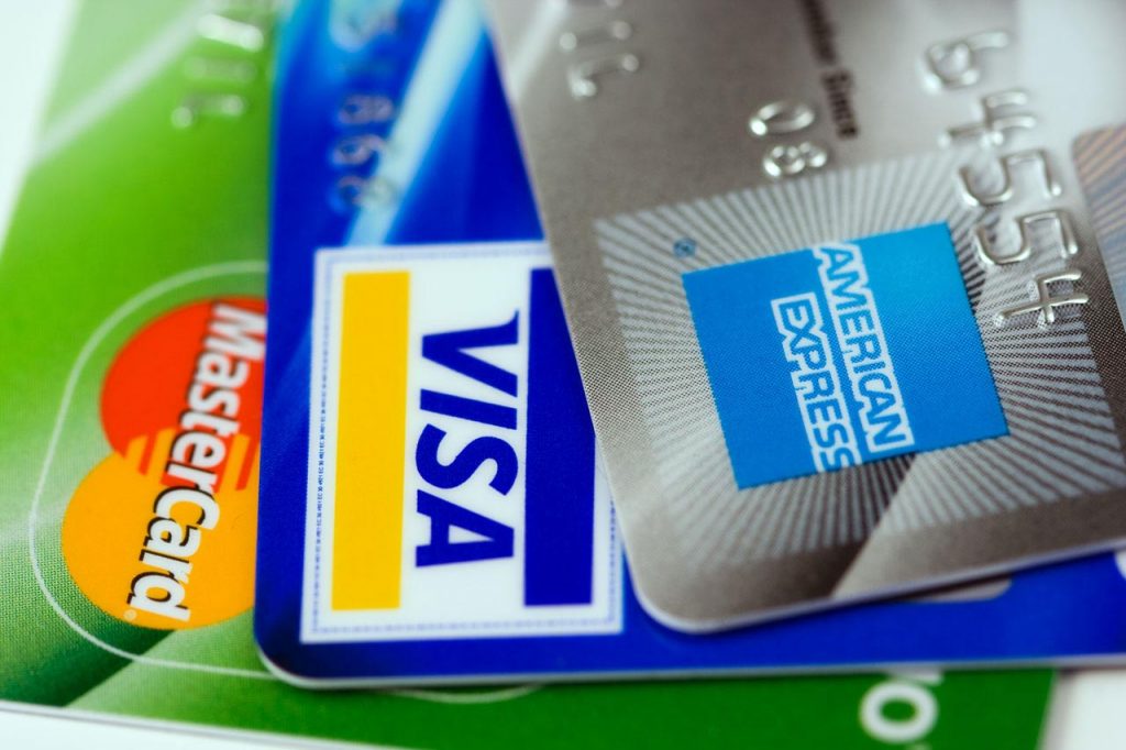 3 credit cards, a via, American express and mastercard
