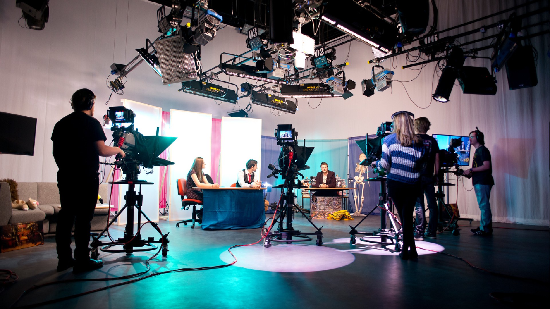 Students filming in a TV studio